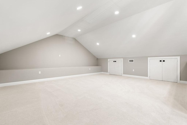 19 Vine Unit 4, Weymouth, MA 02188 - additional living space featuring baseboards, vaulted ceiling, light colored carpet, and recessed lighting