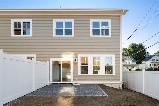 19 Vine Unit 4, Weymouth, MA 02188 - rear view of property with a patio and a fenced backyard