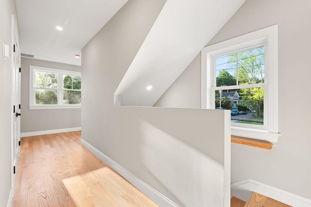 19 Vine Unit 4, Weymouth, MA 02188 - corridor featuring wood finished floors, baseboards, recessed lighting, and an upstairs landing