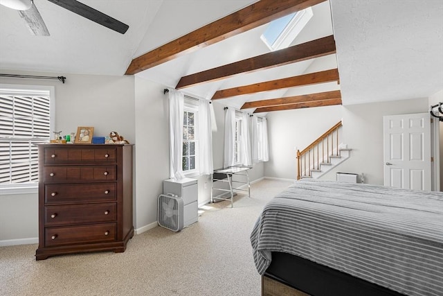 453 Turnpike St Unit 19, Easton, MA 02375 - bedroom featuring light carpet, ceiling fan, and a skylight