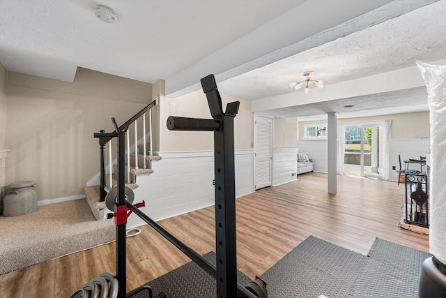 453 Turnpike St Unit 19, Easton, MA 02375 - workout area with wood finished floors and a wainscoted wall