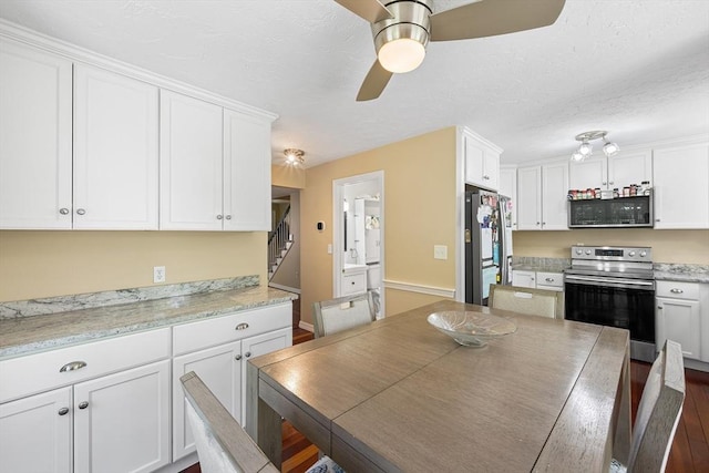 453 Turnpike St Unit 19, Easton, MA 02375 - kitchen featuring stainless steel appliances, ceiling fan, white cabinets, and light countertops