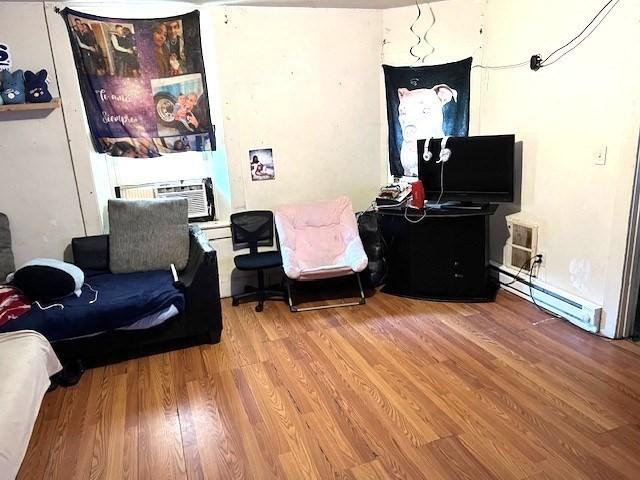 40 Byers St, Springfield, MA 01105 - home office featuring baseboard heating and wood finished floors