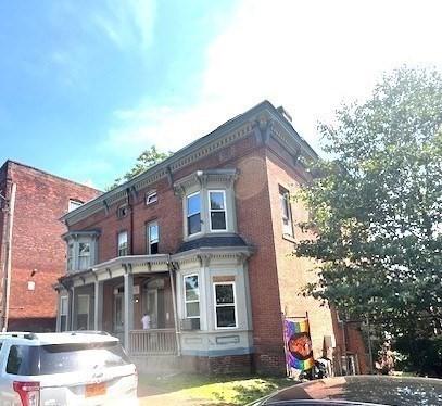 40 Byers St, Springfield, MA 01105 - view of front facade with brick siding