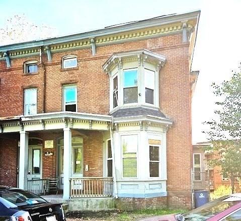 40 Byers St, Springfield, MA 01105 - italianate-style house featuring brick siding and a porch