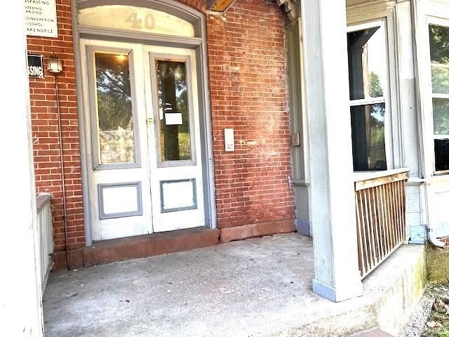 40 Byers St, Springfield, MA 01105 - view of exterior entry featuring brick siding