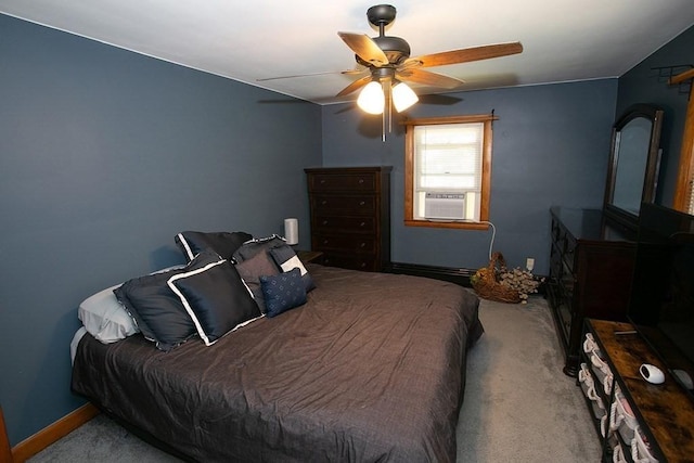 bedroom with carpet floors, cooling unit, baseboards, and ceiling fan