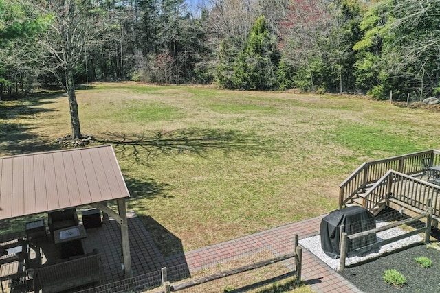 view of yard featuring a wooden deck
