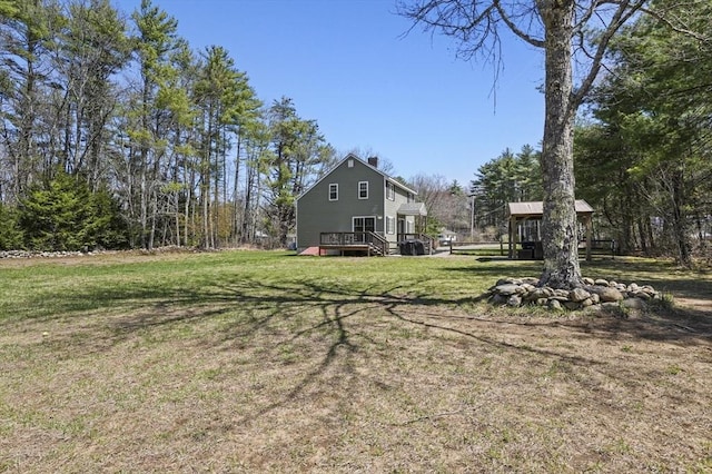 view of yard with a deck
