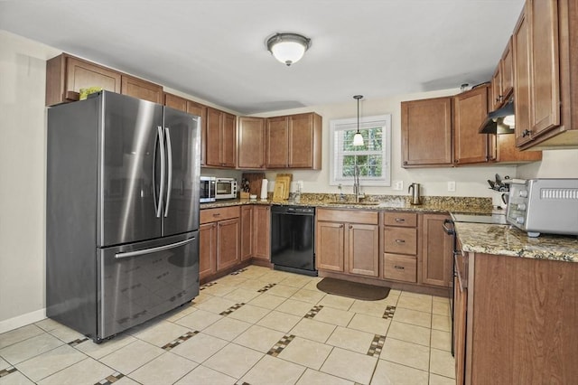 kitchen featuring light tile patterned flooring, stainless steel appliances, under cabinet range hood, and a sink