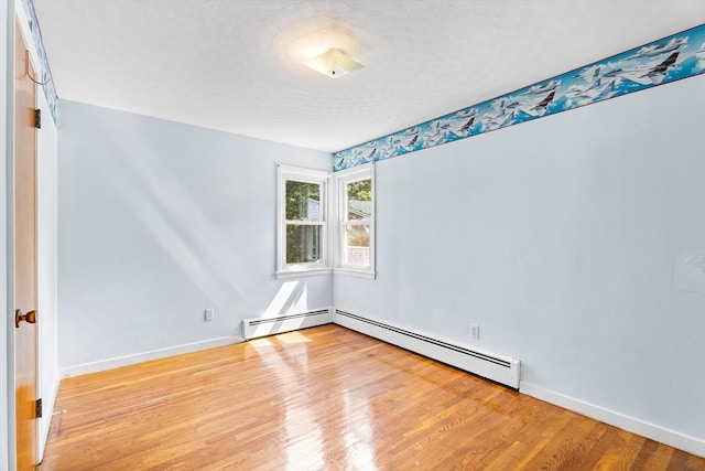 18 Fairview Rd, Westborough, MA 01581 - spare room with wood finished floors and a textured ceiling