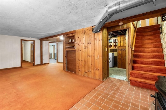 18 Fairview Rd, Westborough, MA 01581 - finished basement with washer / clothes dryer, carpet, stairs, wooden walls, and a textured ceiling
