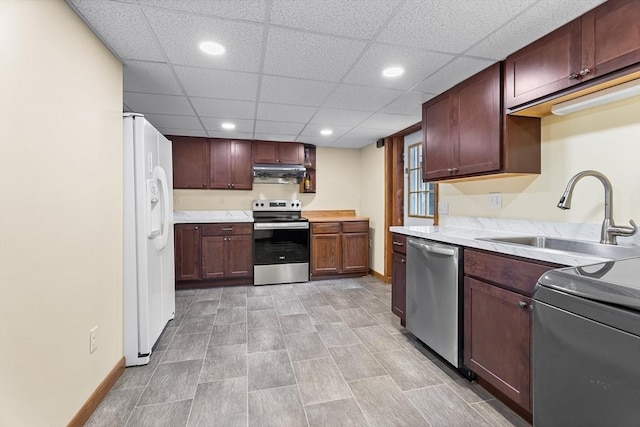 18 Fairview Rd, Westborough, MA 01581 - kitchen with appliances with stainless steel finishes, under cabinet range hood, light countertops, a paneled ceiling, and recessed lighting