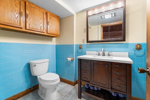 18 Fairview Rd, Westborough, MA 01581 - bathroom with tile walls, vanity, and wainscoting