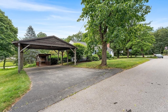 18 Fairview Rd, Westborough, MA 01581 - view of property's community featuring driveway, a lawn, and a detached carport