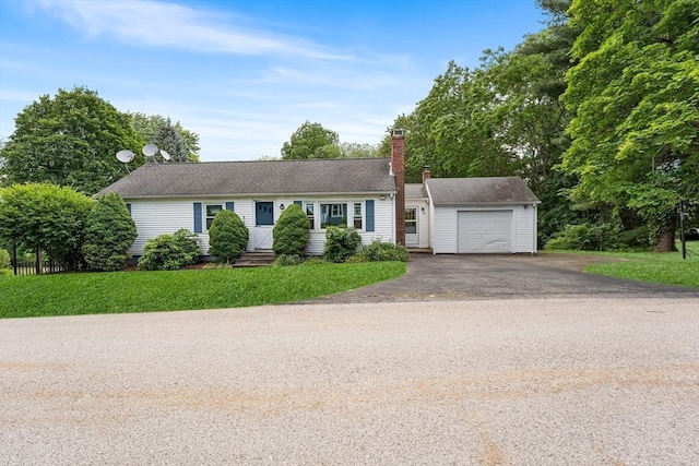 18 Fairview Rd, Westborough, MA 01581 - view of front facade featuring an attached garage, asphalt driveway, a chimney, and a front lawn