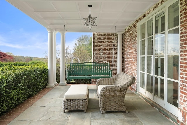 view of terrace with a porch