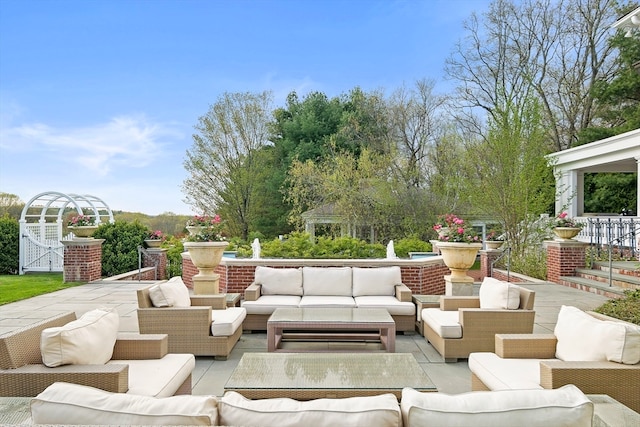 view of terrace with an outdoor living space