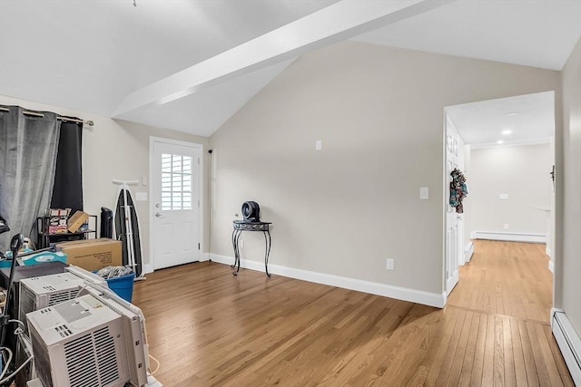 foyer with vaulted ceiling with beams, wood-type flooring, and a baseboard radiator