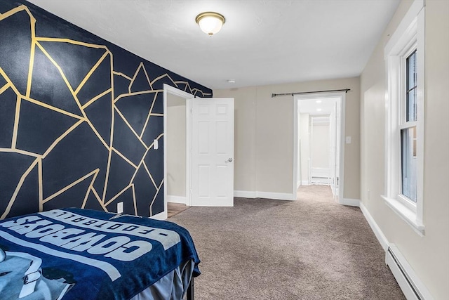 carpeted bedroom featuring a baseboard radiator