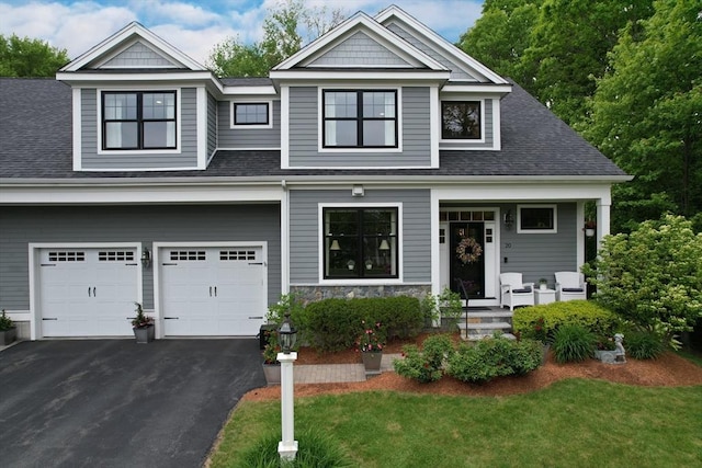20 Davenport Ln Unit 20, Hopkinton, MA 01748 - view of front of house with driveway, a garage, a shingled roof, and a front yard