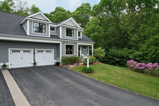 20 Davenport Ln Unit 20, Hopkinton, MA 01748 - view of front facade with driveway, a front yard, roof with shingles, and a garage