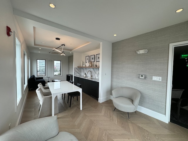 dining area with light parquet floors