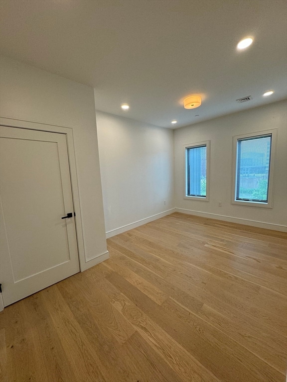 empty room featuring light hardwood / wood-style floors