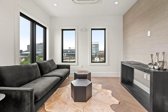 living room featuring parquet flooring