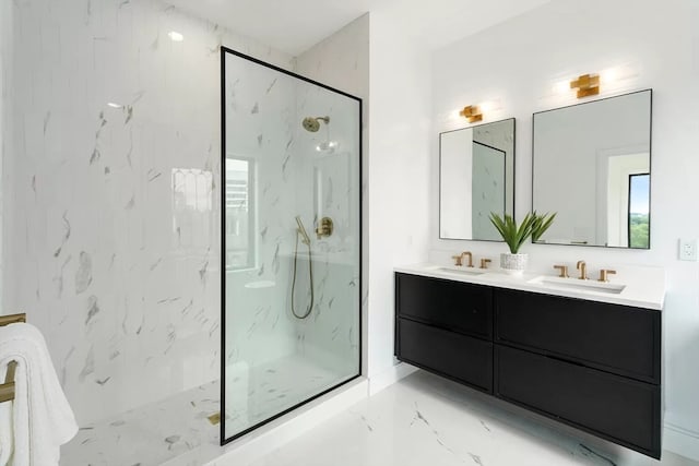 bathroom with tiled shower and vanity