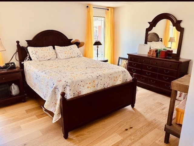 bedroom featuring light wood-type flooring