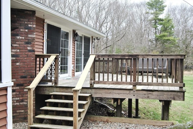 wooden terrace featuring stairs
