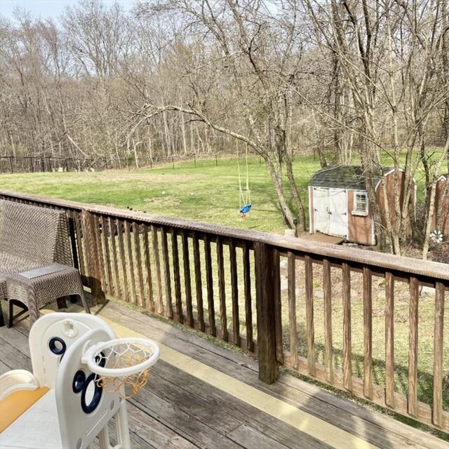 83 Peck St, Rehoboth, MA 02769 - wooden deck with a yard, a shed, and an outbuilding