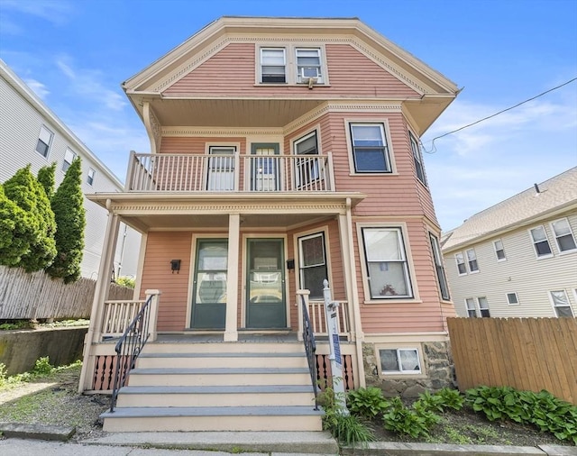 35 Ibbetson, Somerville, MA 02143 - view of front of house featuring a balcony and covered porch