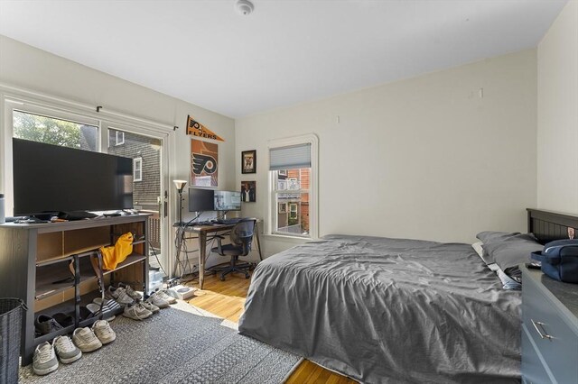 35 Ibbetson, Somerville, MA 02143 - bedroom featuring wood finished floors and a desk