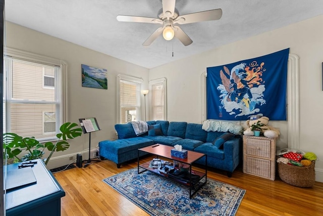 35 Ibbetson, Somerville, MA 02143 - living area featuring light wood-style flooring, healthy amount of natural light, and ceiling fan