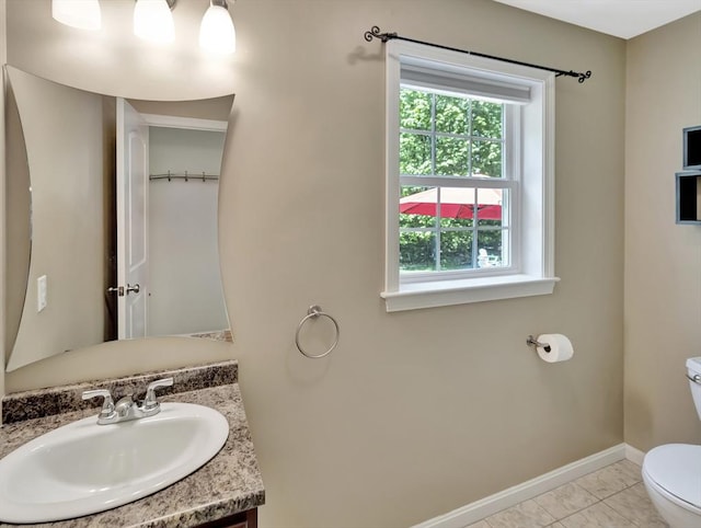 119 Esten Rd, Stoughton, MA 02072 - half bath featuring toilet, baseboards, vanity, and marble finish flooring
