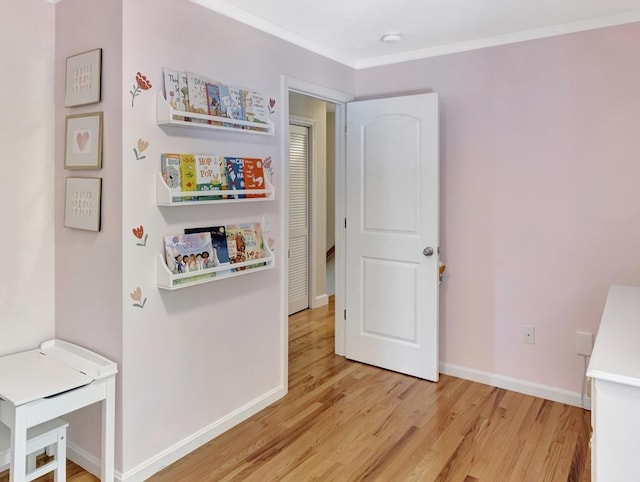 119 Esten Rd, Stoughton, MA 02072 - interior space featuring light wood-style flooring, baseboards, and crown molding
