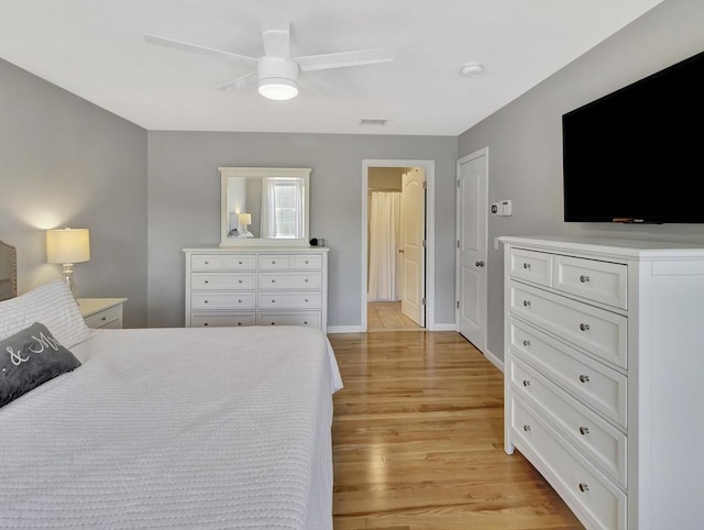119 Esten Rd, Stoughton, MA 02072 - bedroom with light wood finished floors, ceiling fan, and baseboards