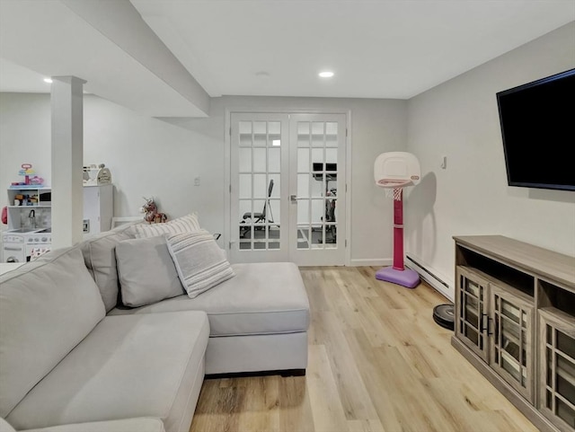 119 Esten Rd, Stoughton, MA 02072 - living room featuring a baseboard radiator, wood finished floors, recessed lighting, and baseboards
