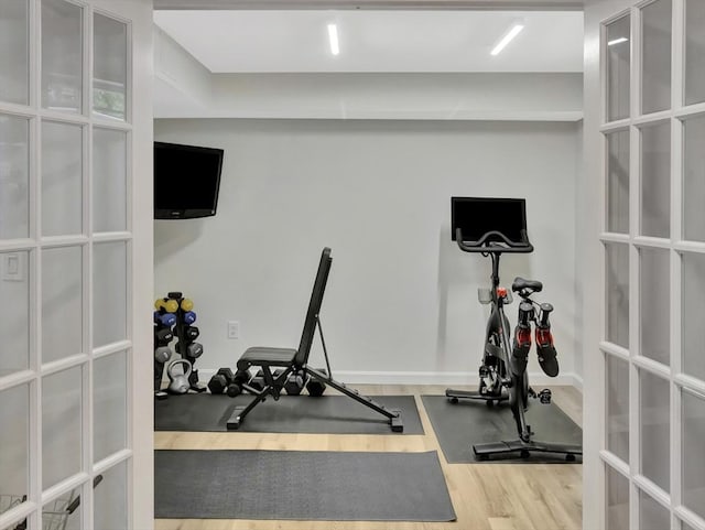 119 Esten Rd, Stoughton, MA 02072 - exercise room featuring wood finished floors and french doors
