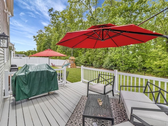 119 Esten Rd, Stoughton, MA 02072 - wooden deck featuring a playground and area for grilling