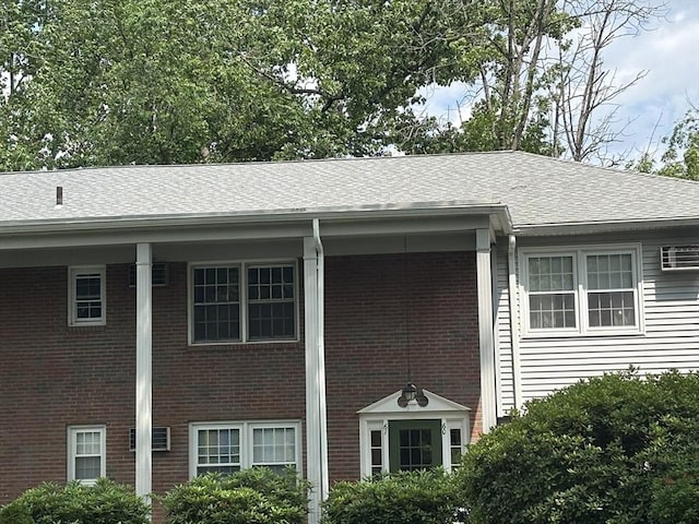 80 Brush Hill Ave Unit 19, West Springfield, MA 01089 - view of side of property featuring brick siding and a shingled roof