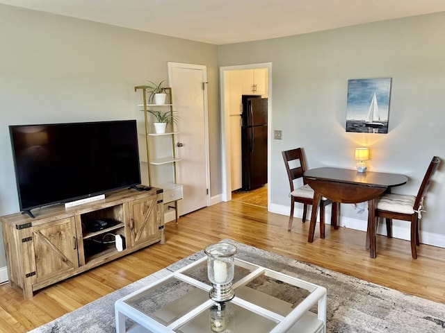 80 Brush Hill Ave Unit 19, West Springfield, MA 01089 - living area with light wood-style flooring and baseboards