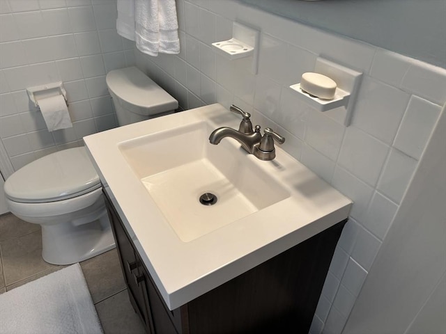80 Brush Hill Ave Unit 19, West Springfield, MA 01089 - half bath featuring vanity, tile walls, tile patterned flooring, and tasteful backsplash