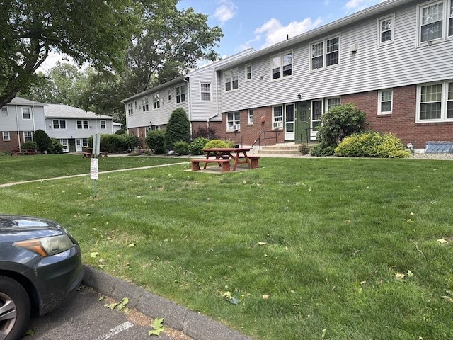 80 Brush Hill Ave Unit 19, West Springfield, MA 01089 - surrounding community with a yard