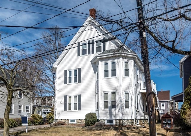 view of front of property featuring a chimney