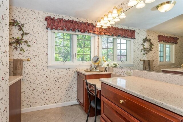 full bathroom with tile patterned floors, wallpapered walls, baseboards, and vanity