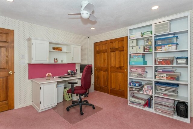 office area featuring ceiling fan, light colored carpet, built in study area, wallpapered walls, and recessed lighting