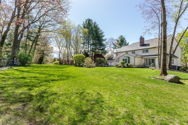view of yard with fence